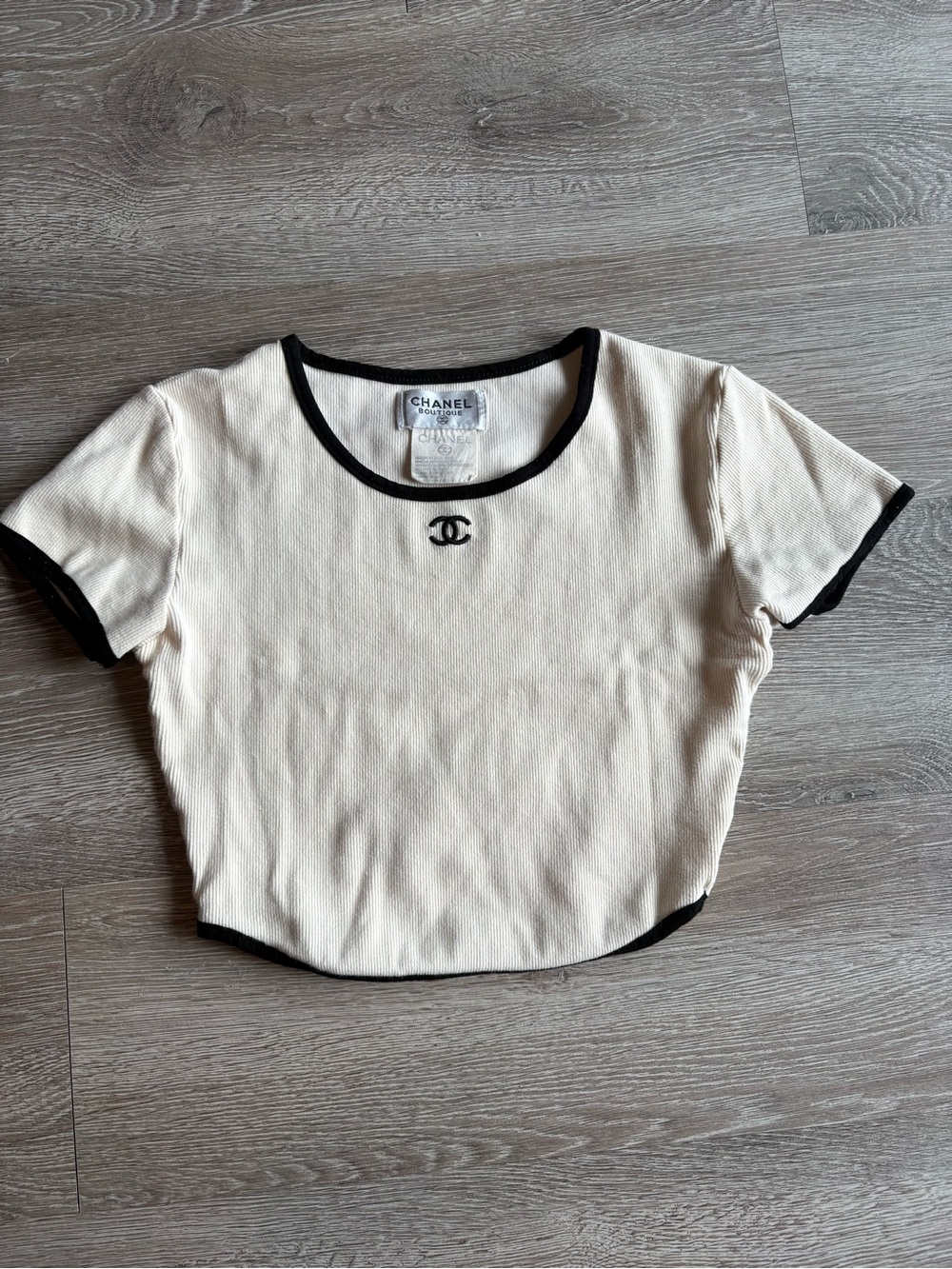 RARE CHANEL Cream Short Sleeve Crop Top with Black Trim and CC Emblem